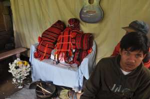 The cleaned bones of relatives are wrapped in native cloth and placed in an altar. Photo by Liezl F. Dunuan