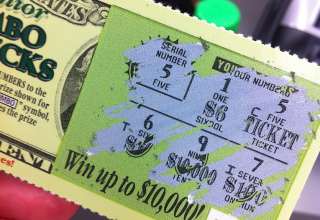 Rhoades, lottery, prize money, lawsuit, Scott, Florida