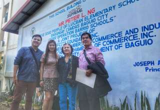 Hotel Supreme General Manager Jeff Ng and wife Kathleen Ng together with Hotel Supreme President Peter Ng and wife Ivy posing in front of the newly-donated classroom for Lucban Elementary School