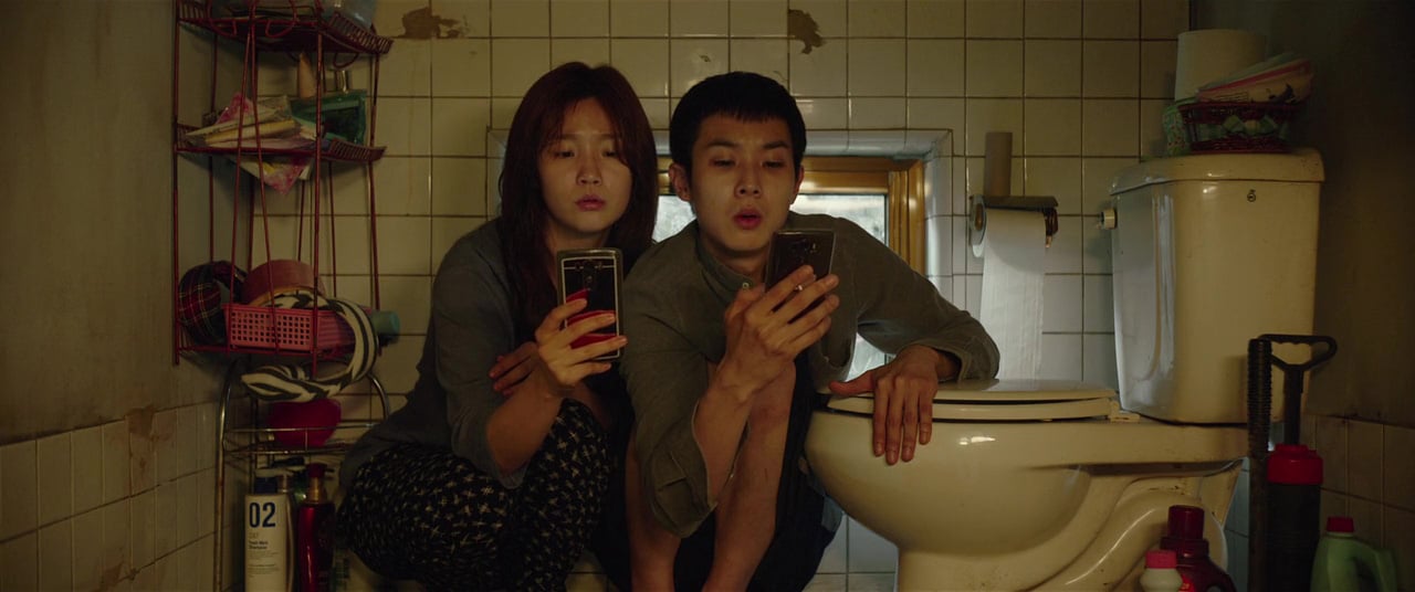 Wo Sik Choi and So Dam Park in Parasite