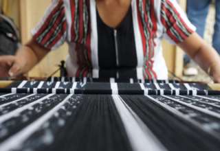 a woman weaving
