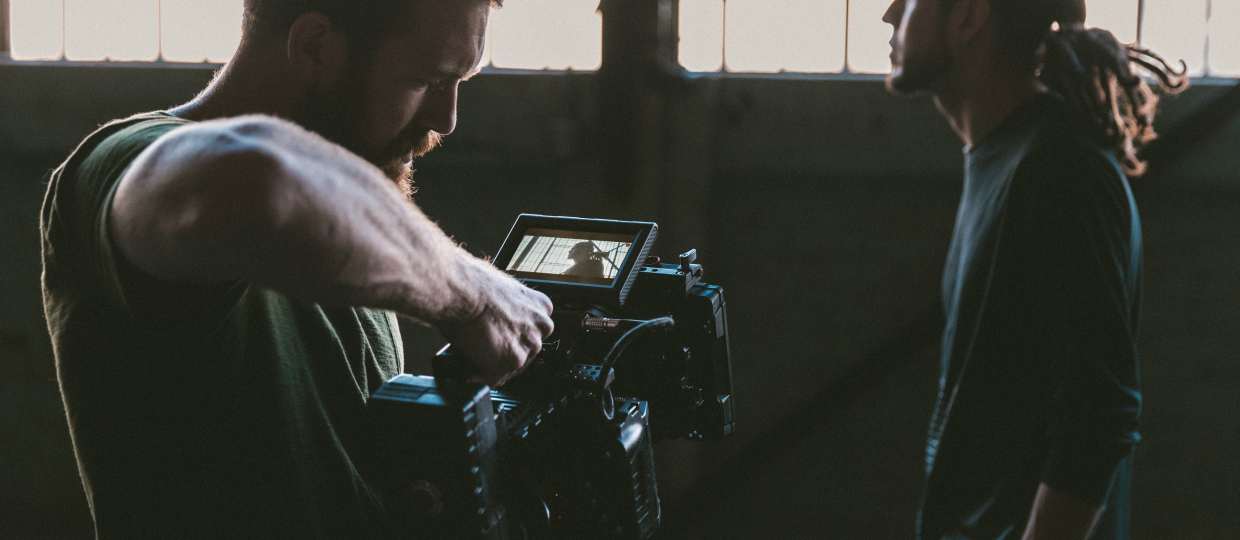 Behind the scenes of a film. Photo via Unsplash.com
