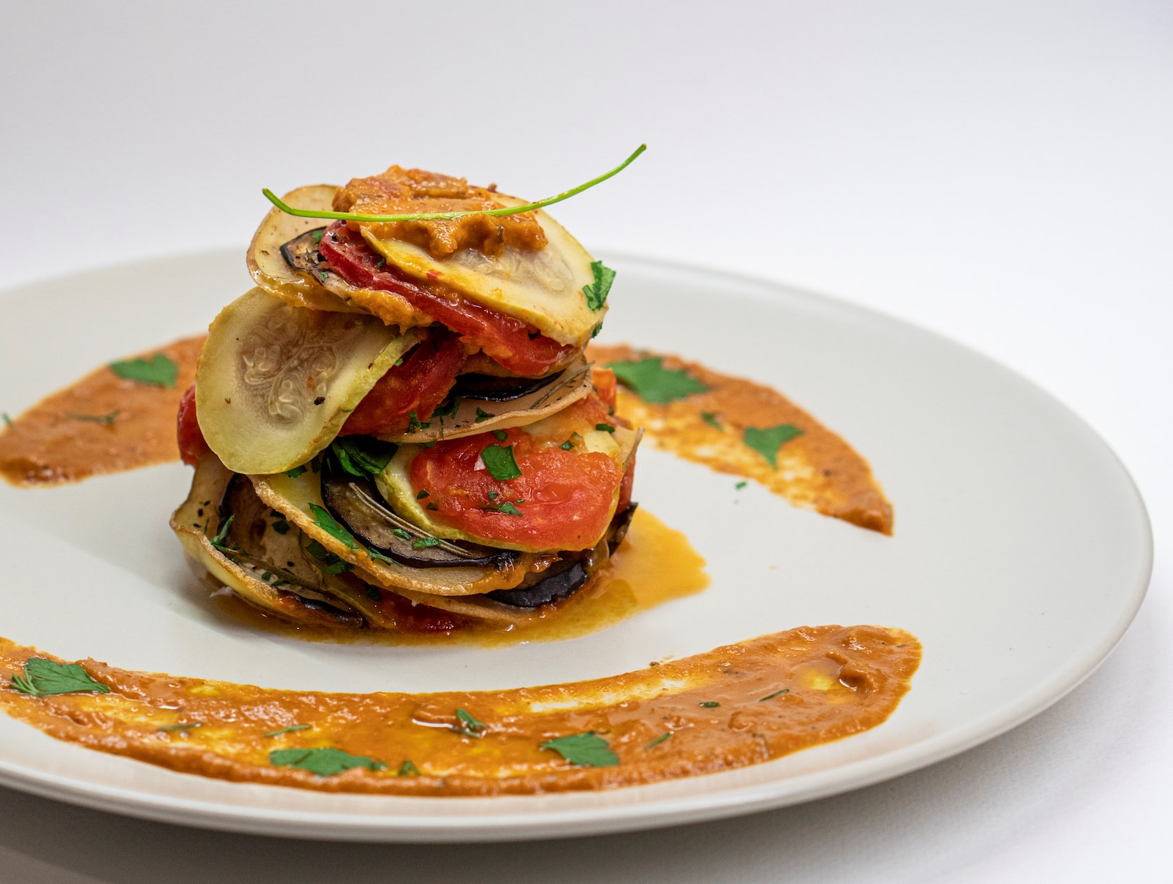 Garnished Ratatouille on a white plate
